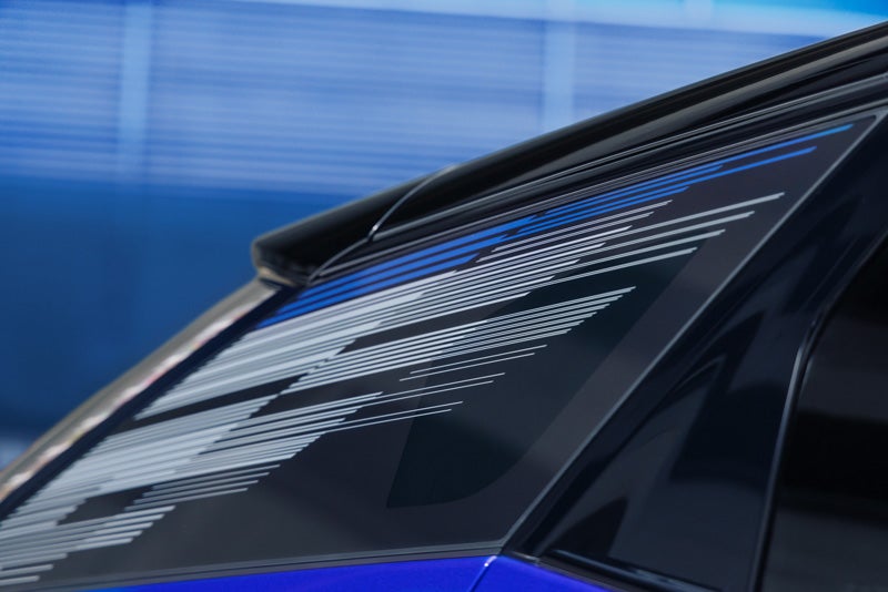 Close-up of the Modern Pattern on the 2026 OPTIQ-V Rear Quarter Glass | Moses Cadillac of Huntington in Huntington WV